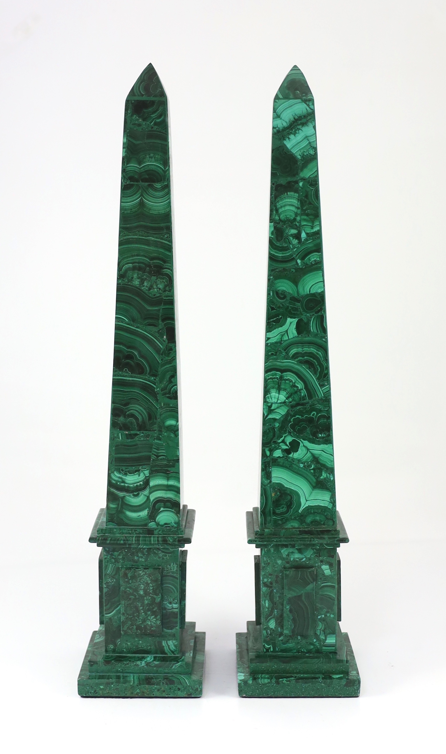 A pair of malachite veneered obelisks 12 x 12cm, 60cm high